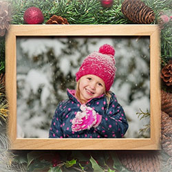 Photo effect - Photo frame with Christmas decorations from pine cones