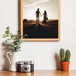 Photo effect - Wooden photo frame on the white wall
